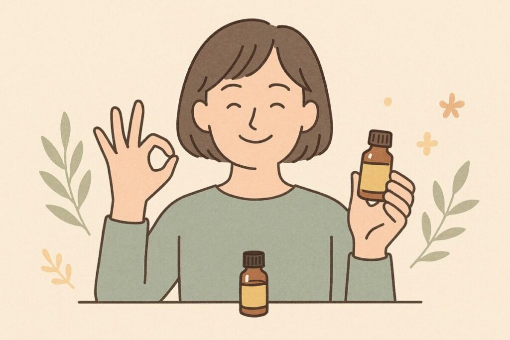 アロマオイルの安全な捨て方ができてOKサインをしている人物